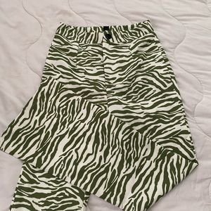 Green zebra pants